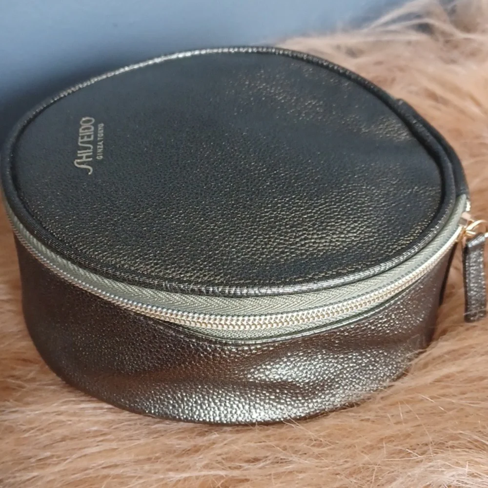 Shiseido Metallic Round Cosmetic Bag